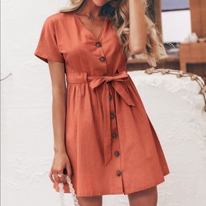 Beautiful buttoned dress.